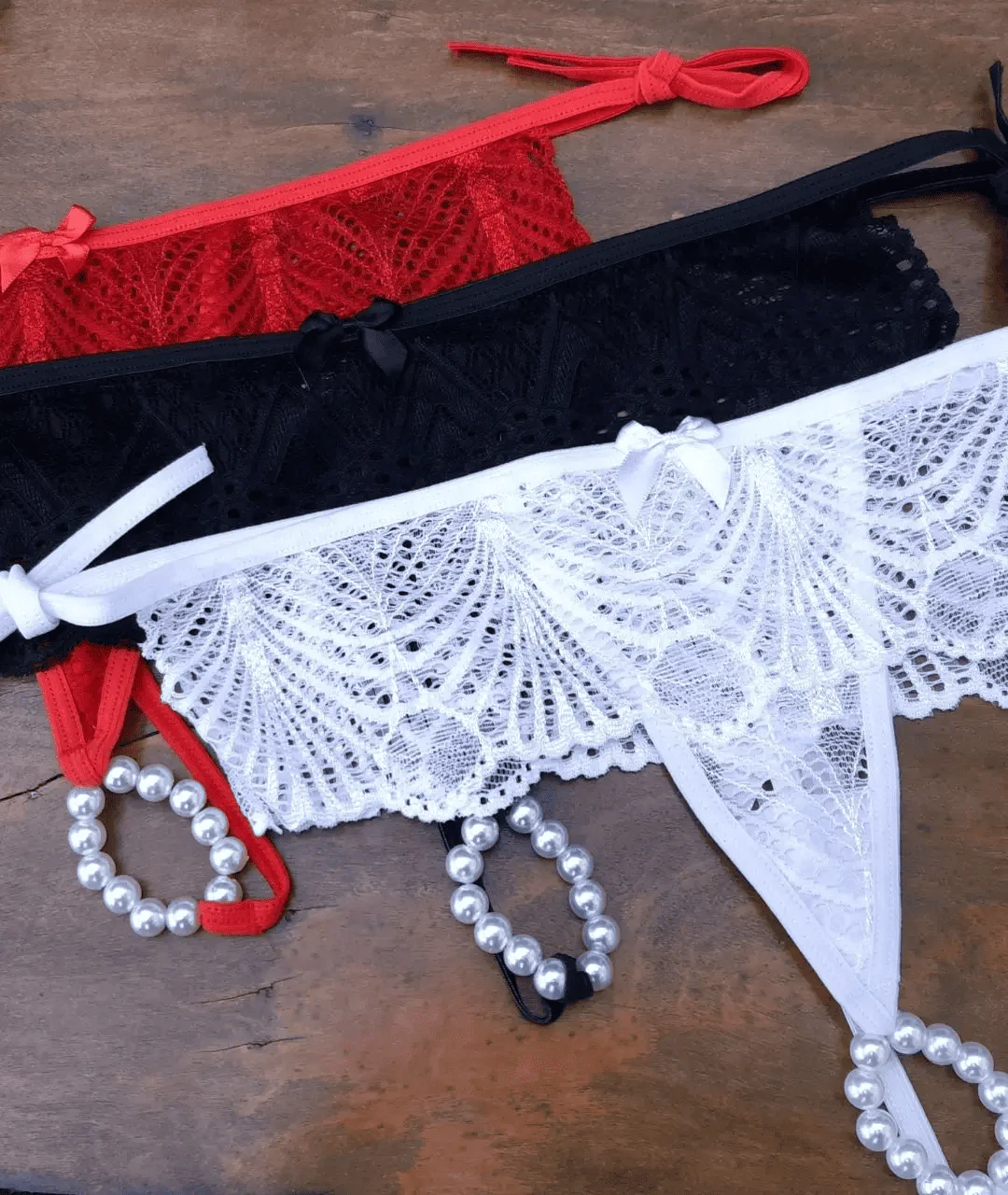 K140 Tanga Tailandesa com Pérolas